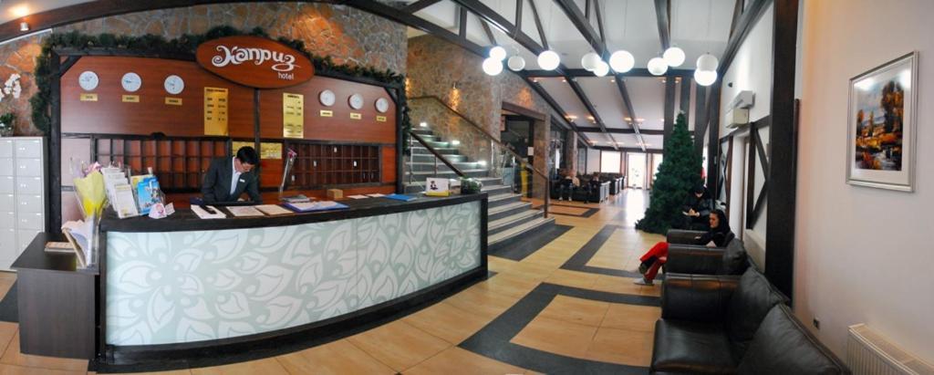 Kapriz Karakol Hotel Exterior photo